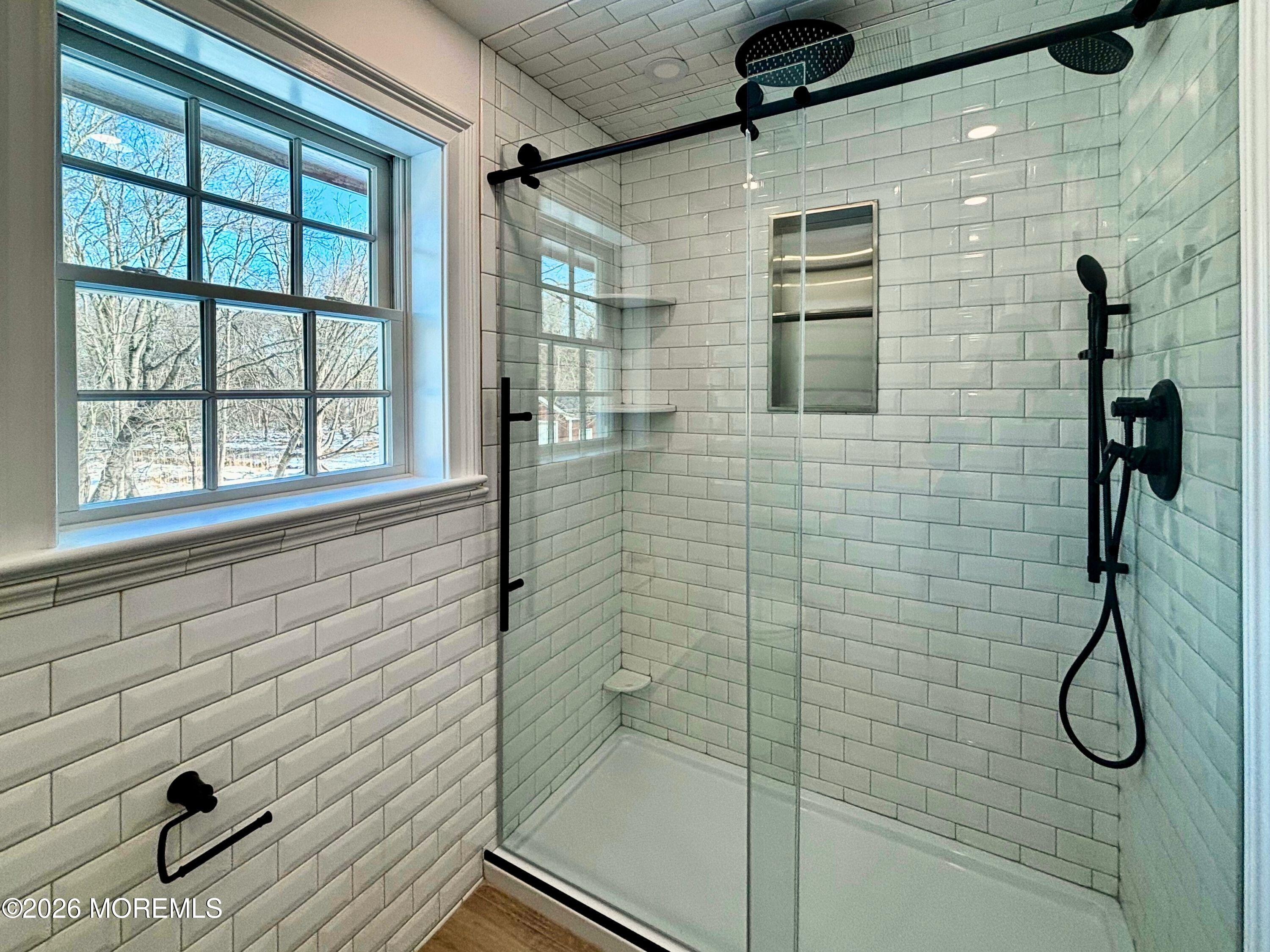 2364 Hurley Pond Road, Unit BACK TOP Wall, NJ 07719 - Photo 9 of 11 a bathroom with a shower