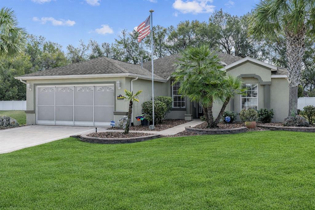 16339 Southwest 14th Avenue Road Ocala, FL 34473 - Photo 3 of 22 a view of a house with backyard and sitting area