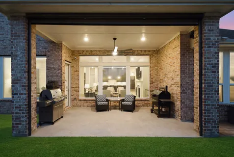 a lobby with furniture and floor to ceiling window