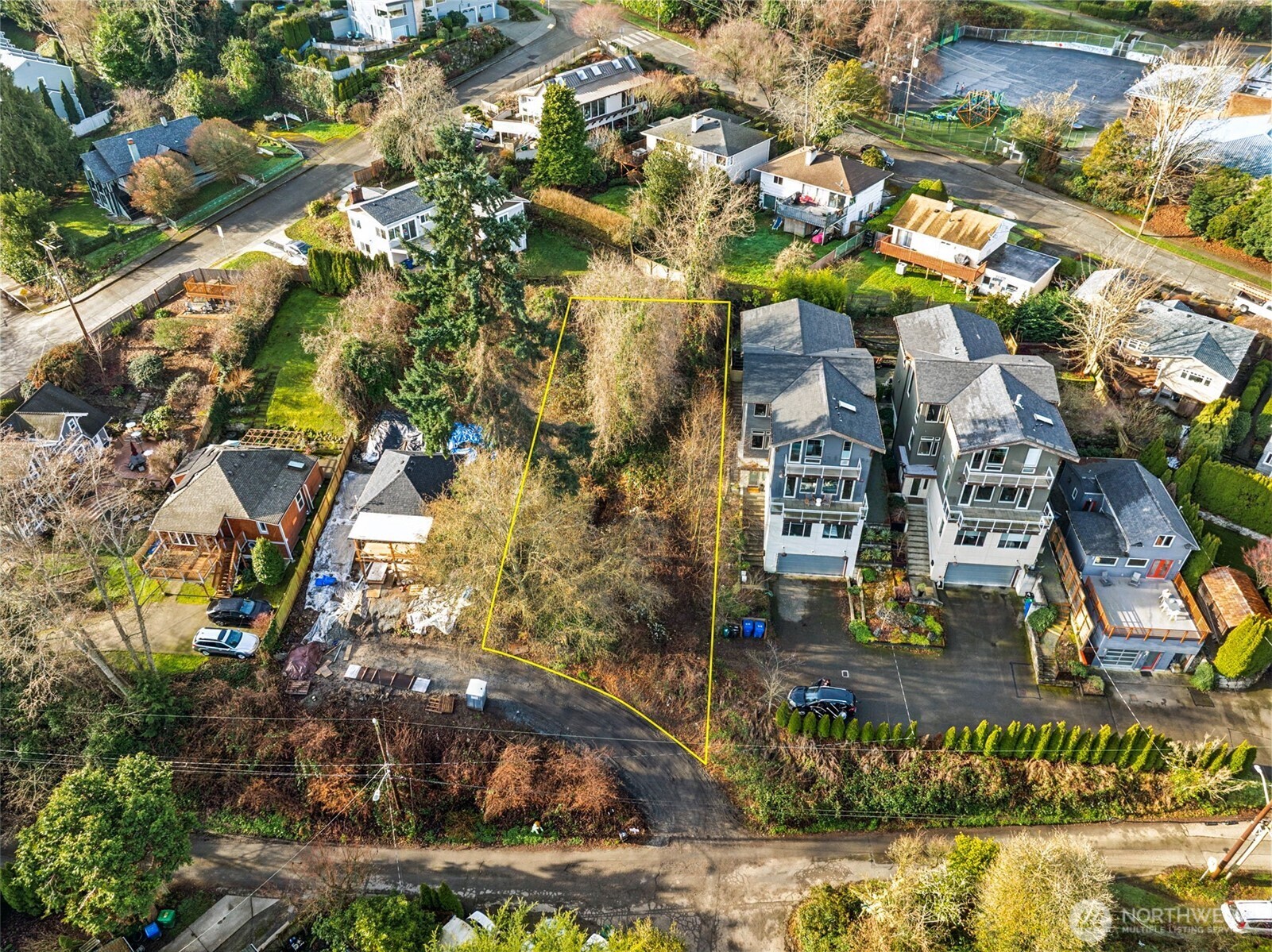 4019 Burton Place West Seattle, WA 98199 - Photo 1 of 18 a picture of houses with outdoor space