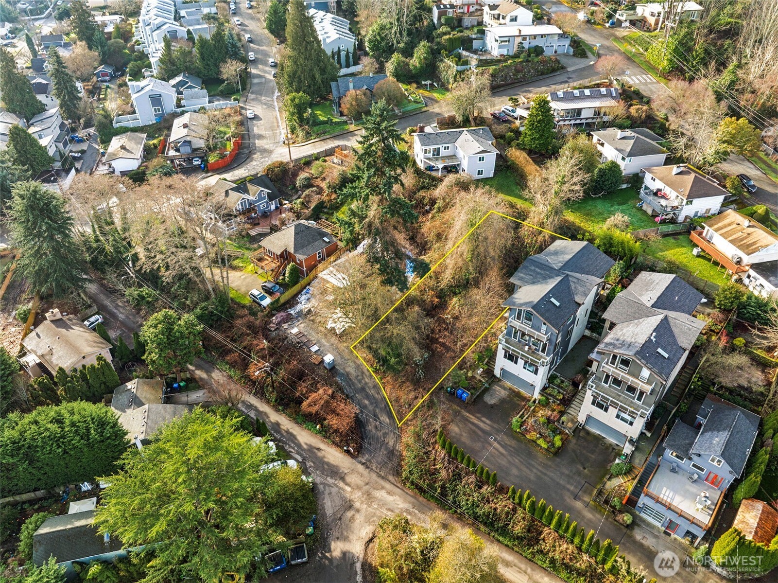 4019 Burton Place West Seattle, WA 98199 - Photo 11 of 18 an aerial view of residential houses with outdoor space