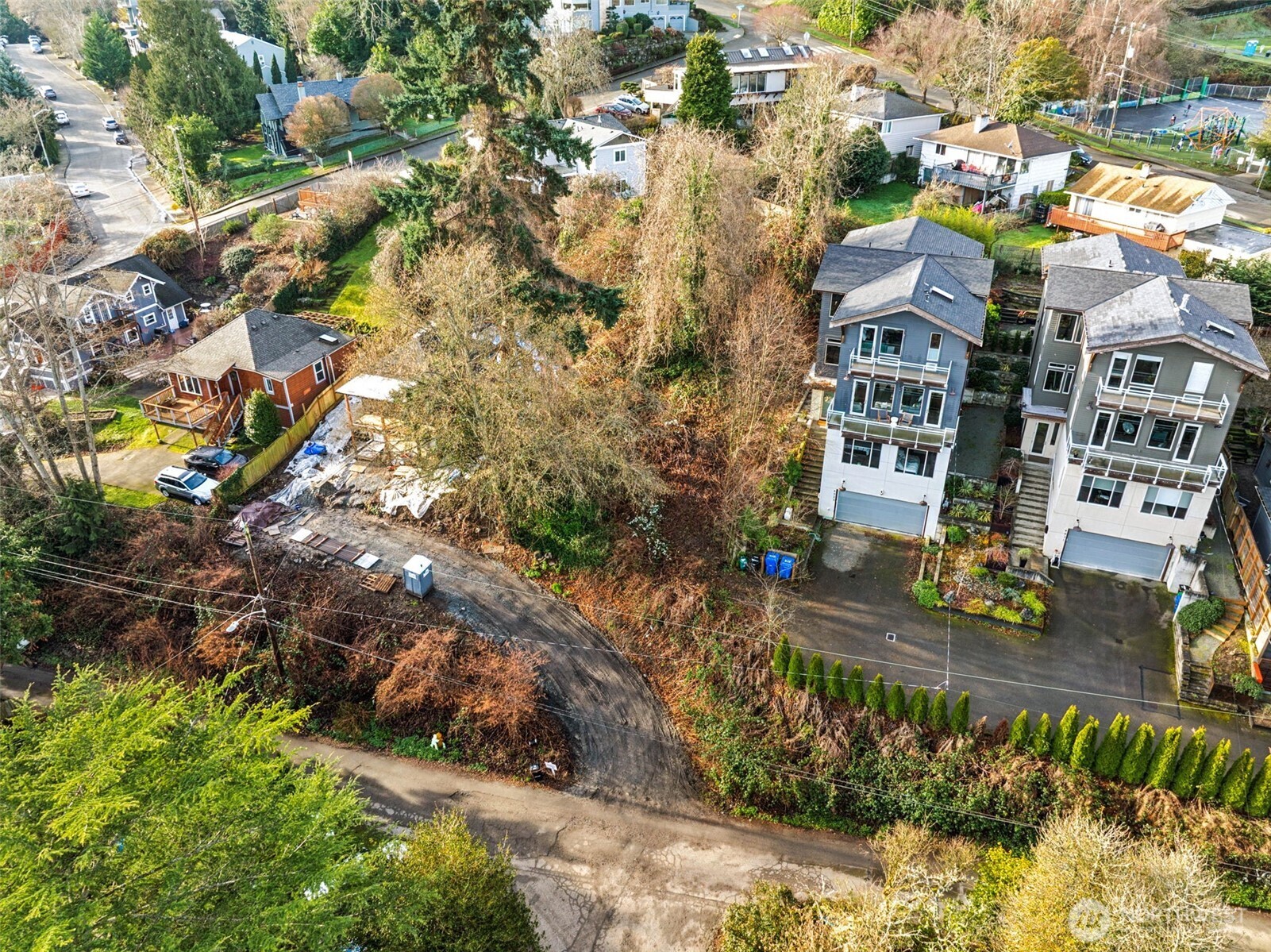 4019 Burton Place West Seattle, WA 98199 - Photo 14 of 18 an aerial view of residential houses with yard