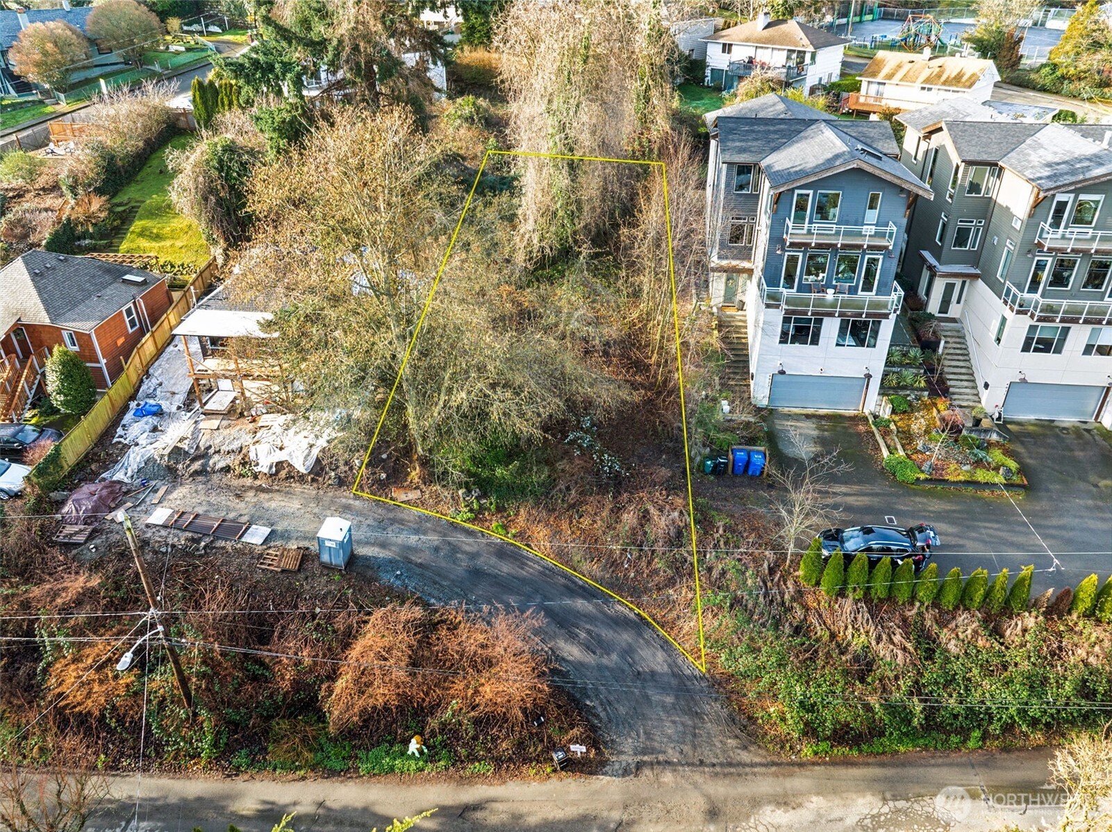 4019 Burton Place West Seattle, WA 98199 - Photo 6 of 18 a front view of a house with a yard