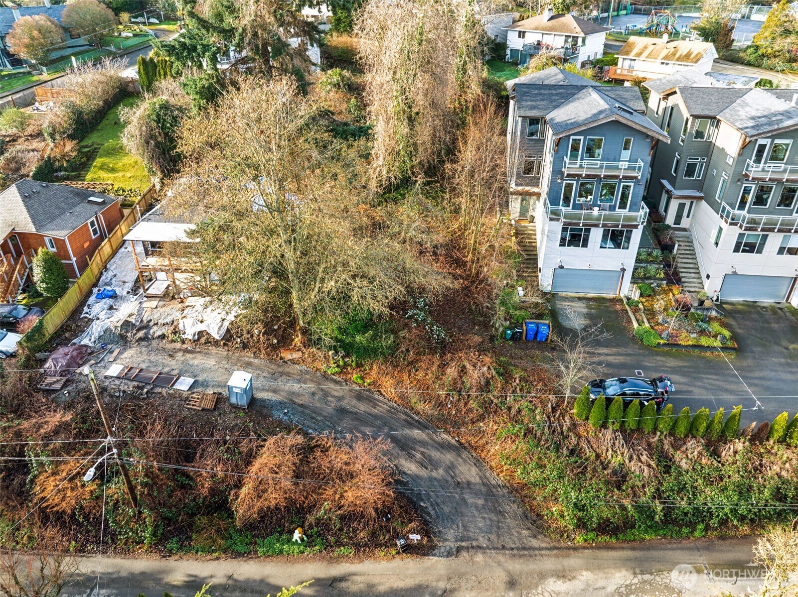 4019 Burton Place West Seattle, WA 98199 - Photo 7 of 18 a front view of a house with a yard