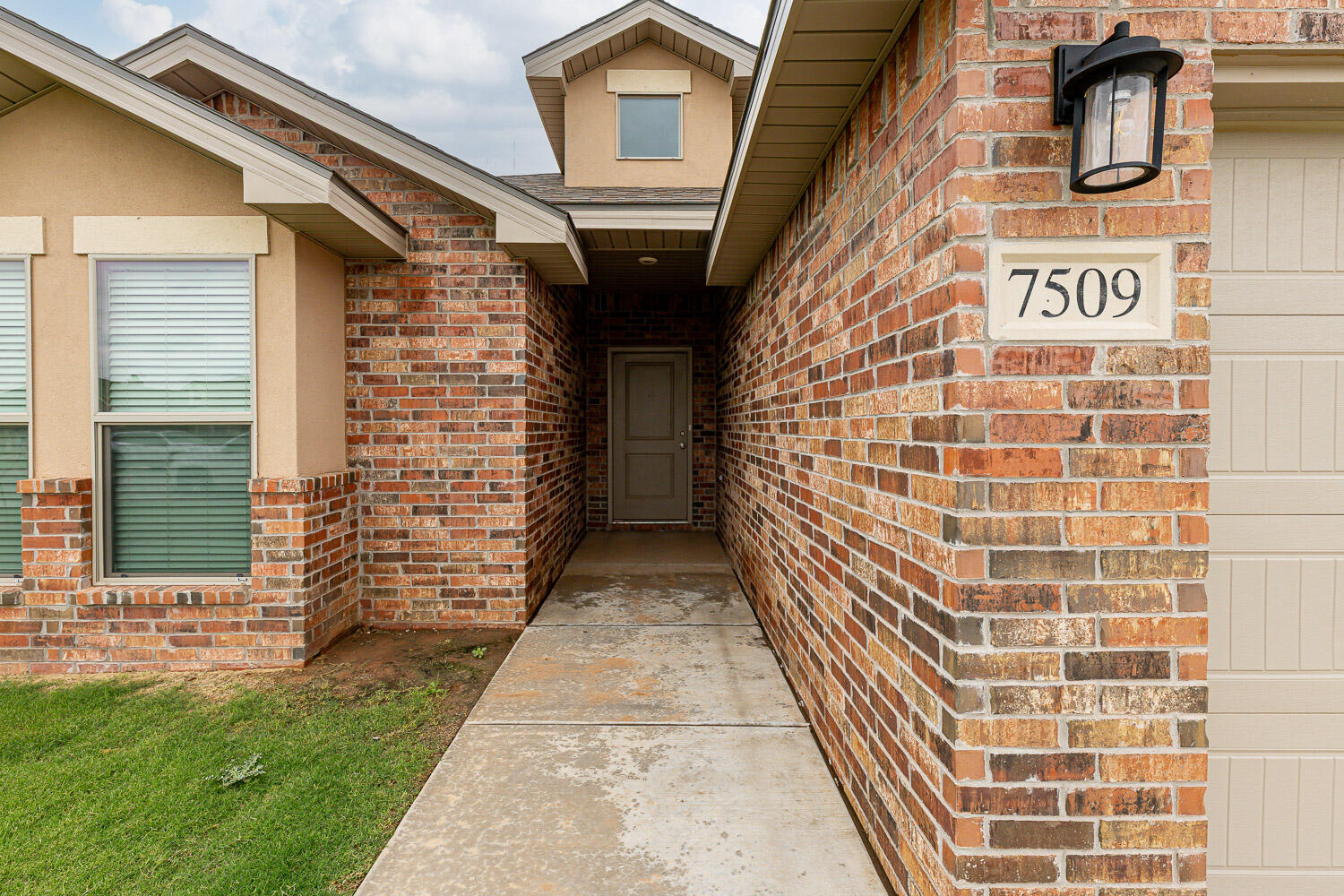 7509 26th Street Lubbock, TX 79407 - Photo 7 of 48 a view of front door of house