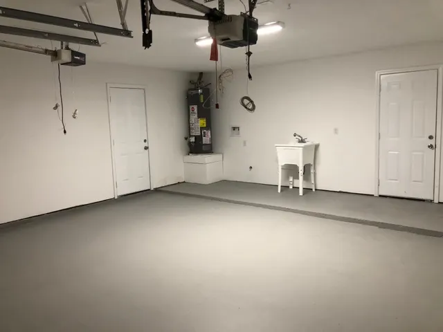 an empty room with a ceiling fan