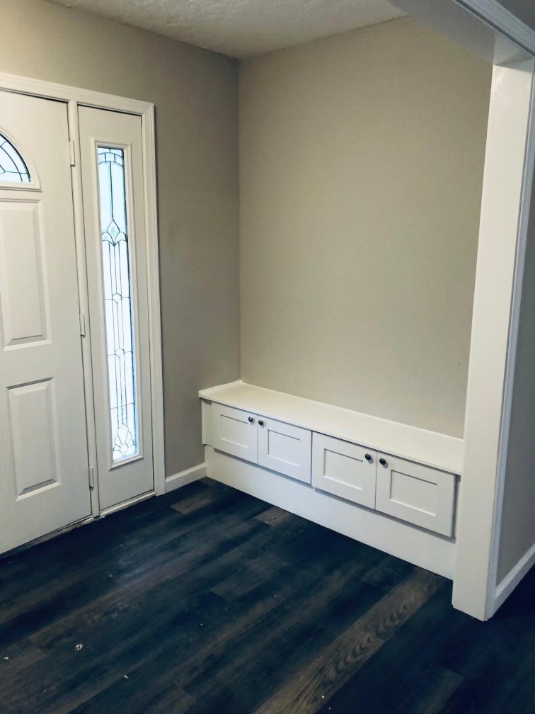 24803 Hickory Hill Road Spring, TX 77380 - Photo 3 of 13 a view of an empty room with wooden floor and a window