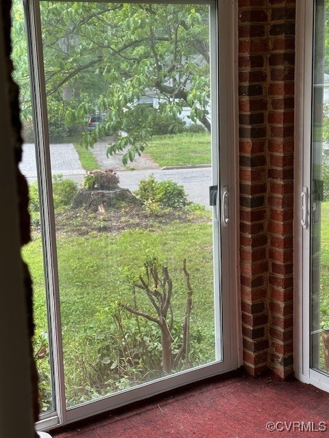7401 Biscayne Road Henrico, VA 23294 - Photo 25 of 29 Doorway to outside with dark colored carpet