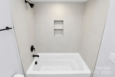 a bathroom with a bathtub