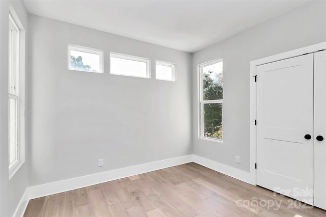 an empty room with windows