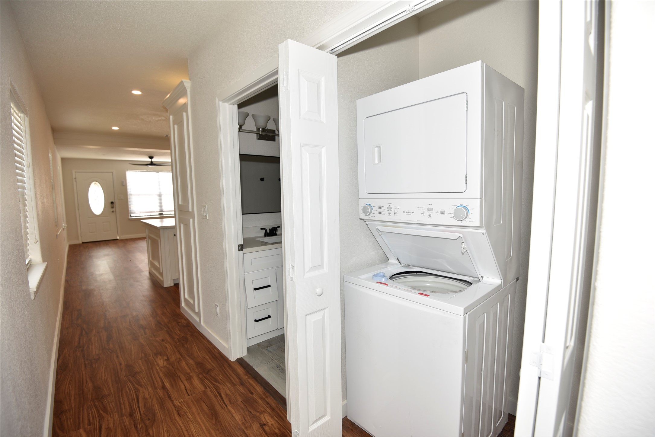 4322 Allen Street Houston, TX 77007 - Photo 11 of 17 a view of walk in closet with wooden floor