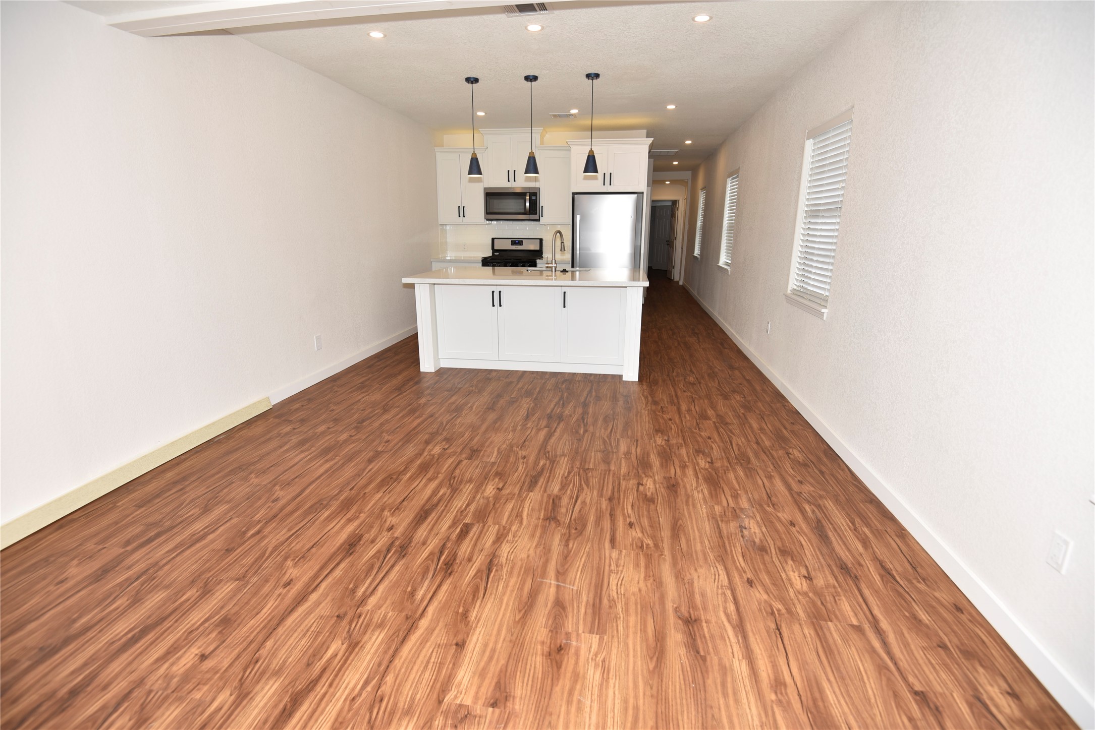 4322 Allen Street Houston, TX 77007 - Photo 6 of 17 a view of a kitchen with wooden floor