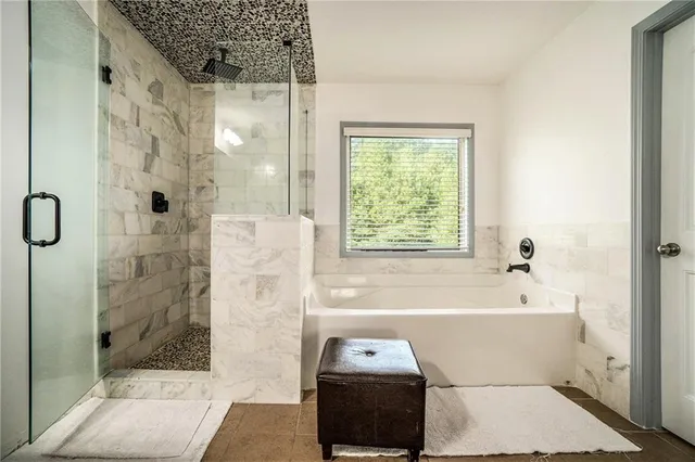 a bathroom with a sink vanity and mirror