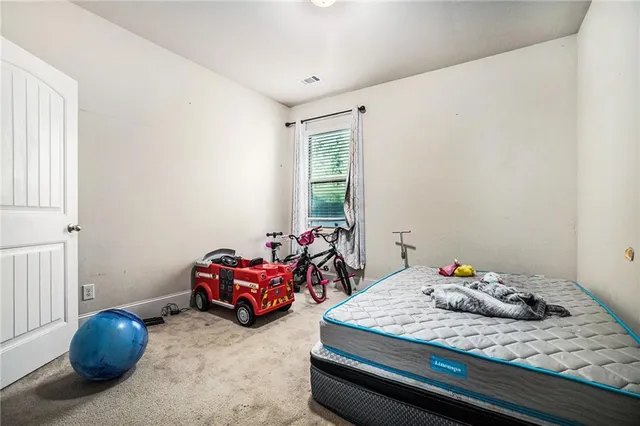 a bathroom with a sink toilet and a mirror