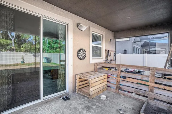 a outdoor space with the couches and a dining table chair