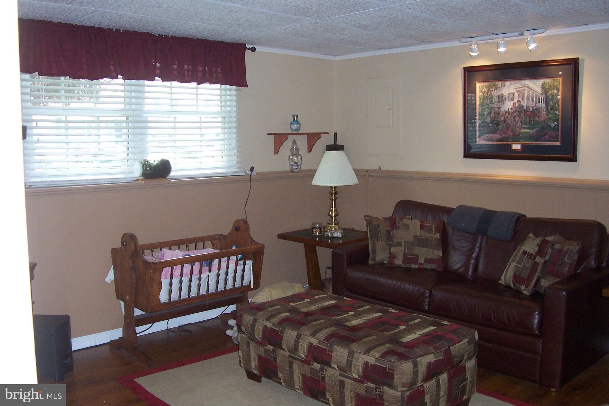32 Yew Road Baltimore, MD 21221 - Photo 17 of 30 a living room with furniture and a window