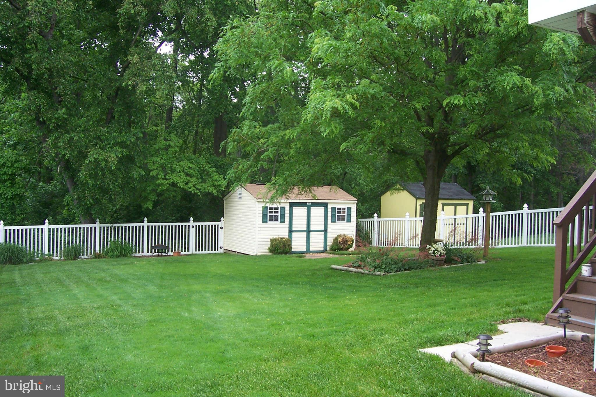 32 Yew Road Baltimore, MD 21221 - Photo 25 of 30 a view of a house with a yard and sitting area