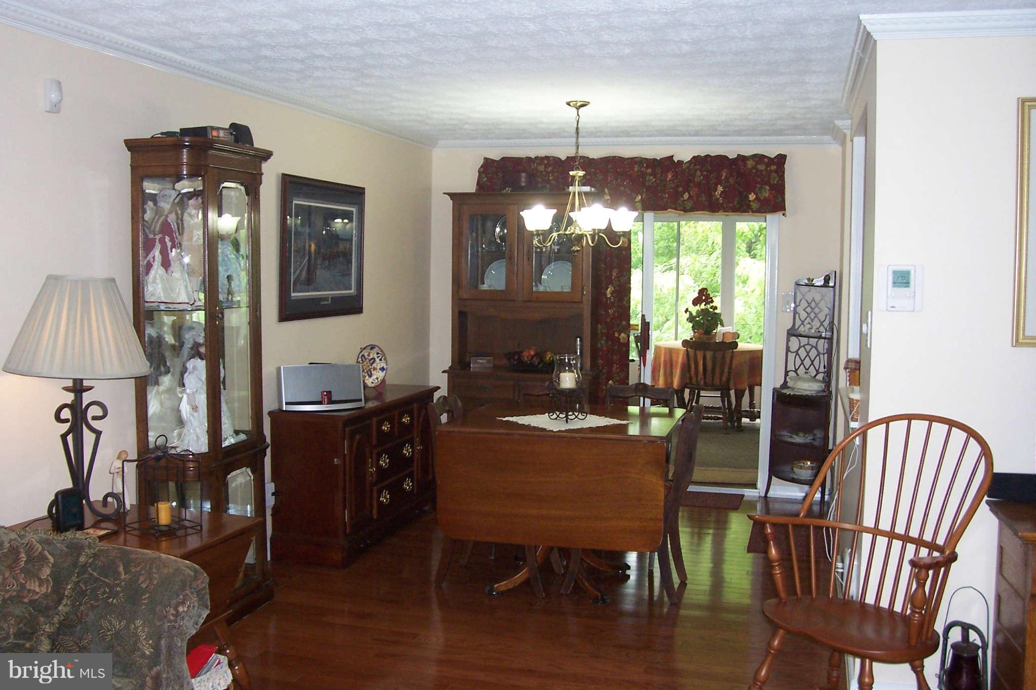 32 Yew Road Baltimore, MD 21221 - Photo 6 of 30 a view of a dining room with furniture window and outside view