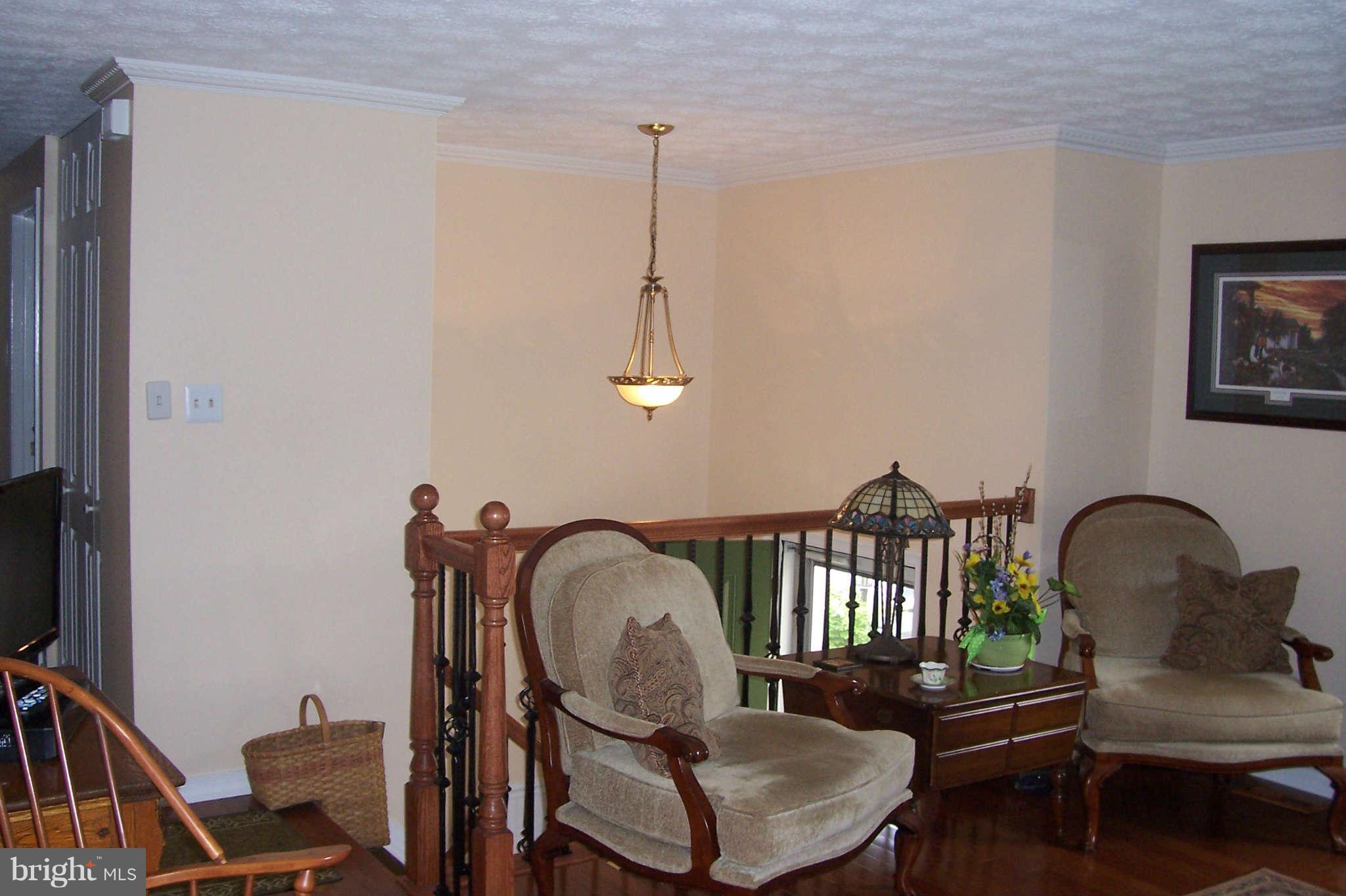 32 Yew Road Baltimore, MD 21221 - Photo 9 of 30 a view of a room with furniture and wooden floor