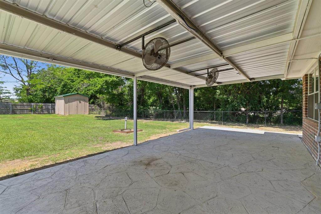 1974 County Road Powderly, TX 75473 - Photo 8 of 28 a view of a house with backyard and porch