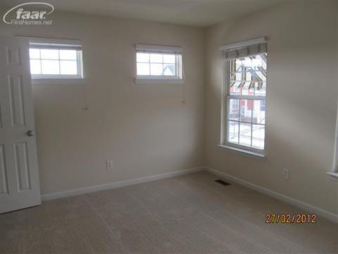 1821 Gilmore Street Howell, MI 48855 - Photo 5 of 6 20243461-4.JPG