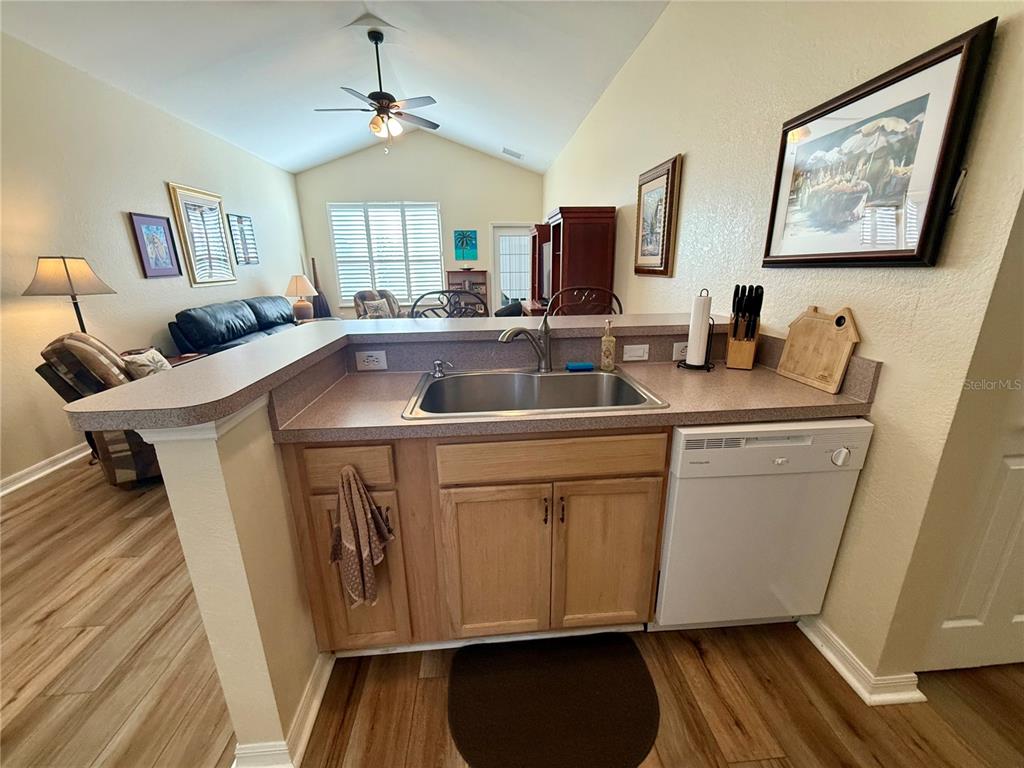11122 Southwest 73rd Court Ocala, FL 34476 - Photo 9 of 36 a kitchen with sink cabinets and window