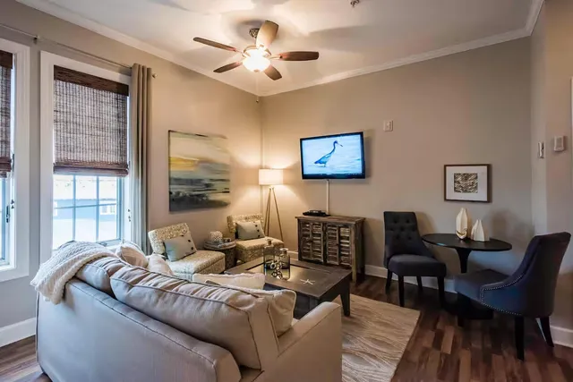 a living room with furniture and a window