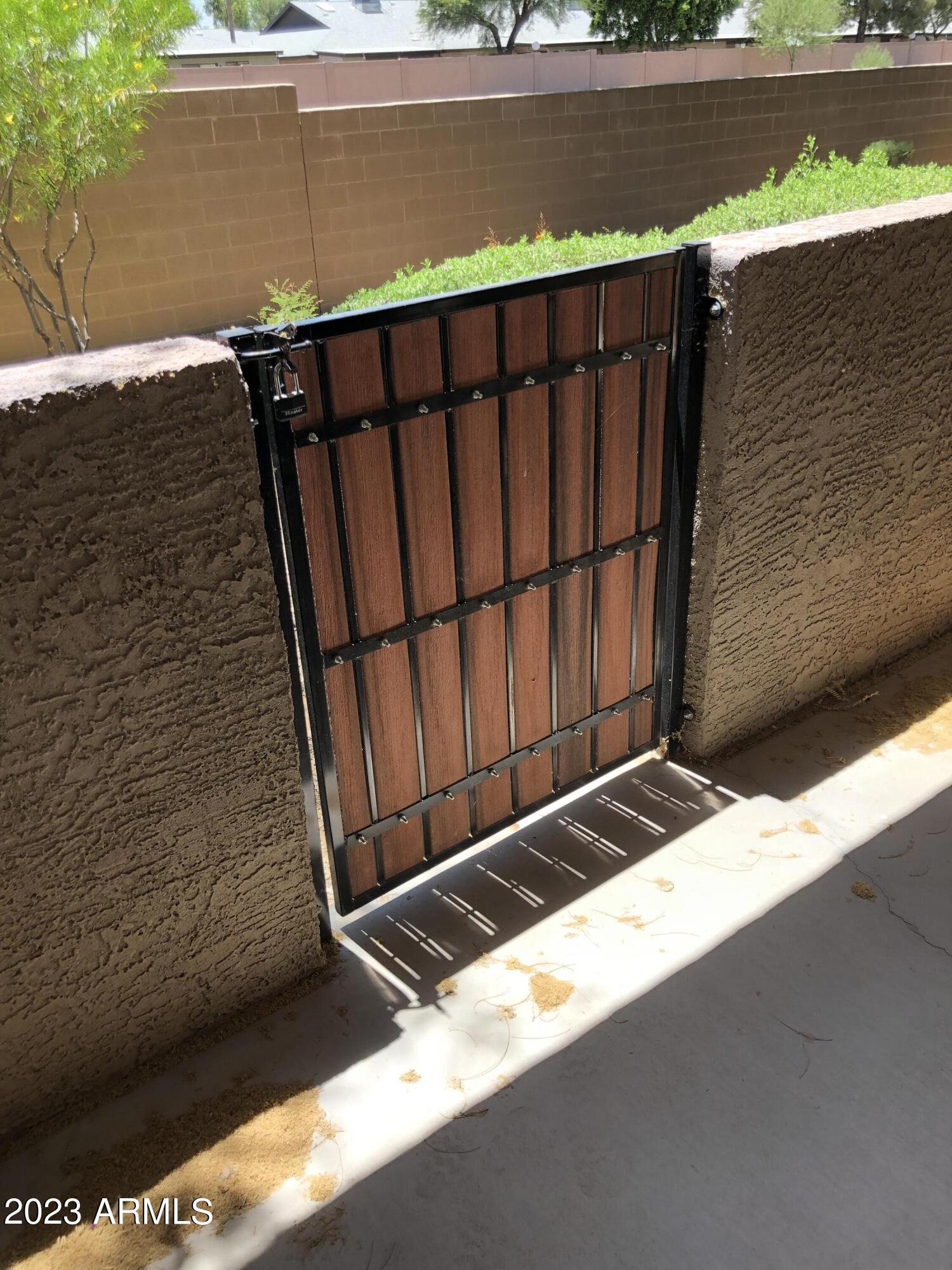 7726 East Baseline Road, Unit 108 Mesa, AZ 85209 - Photo 17 of 31 Gate to green space