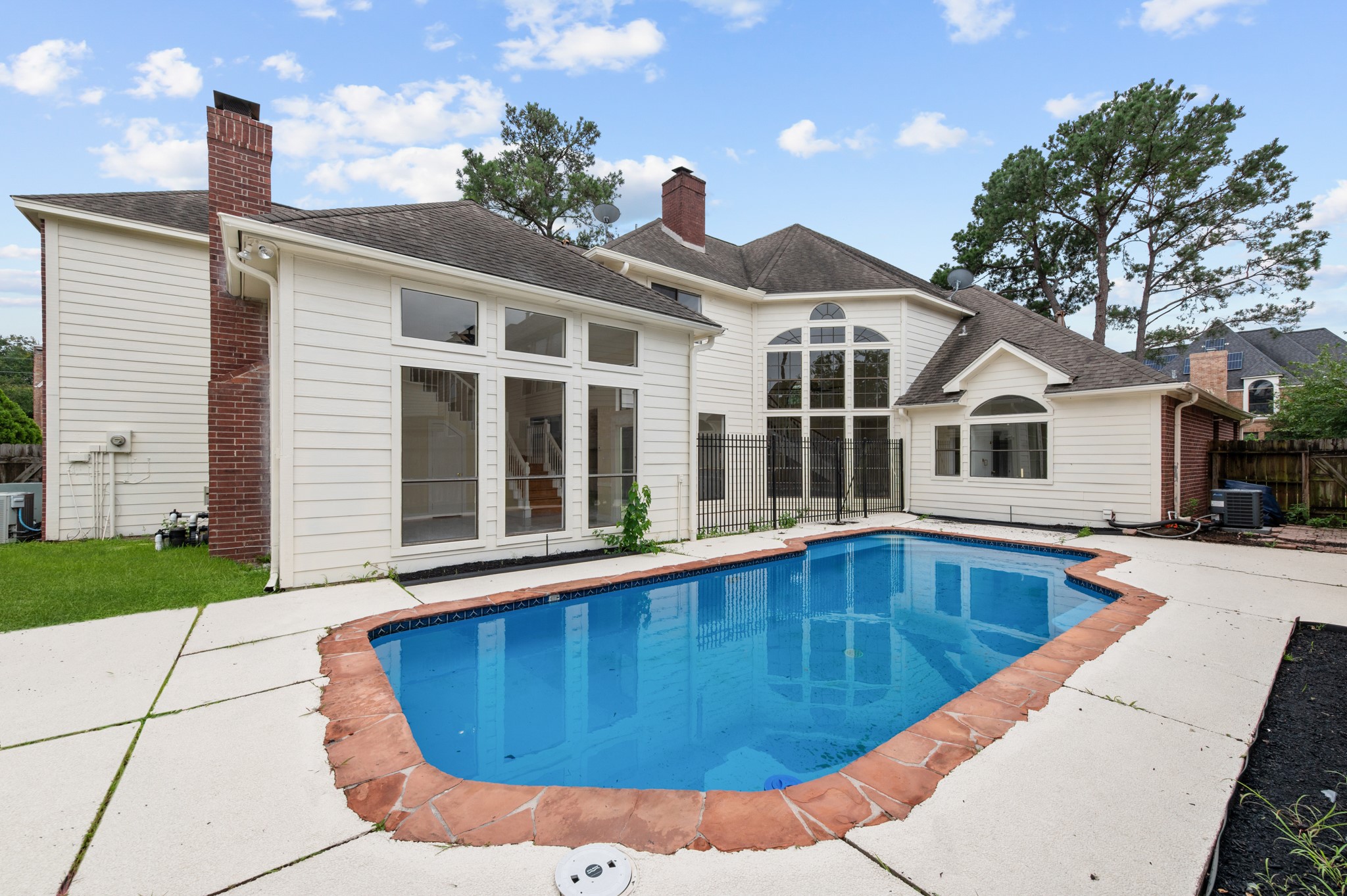 17402 Wilton Park Court Spring, TX 77379 - Photo 20 of 50 a view of a house with pool