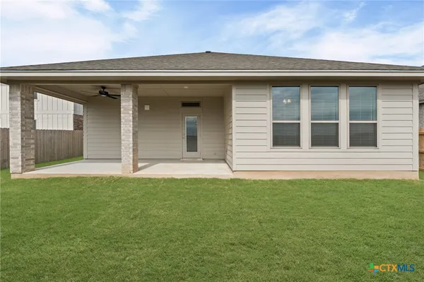 a house view with a garden space