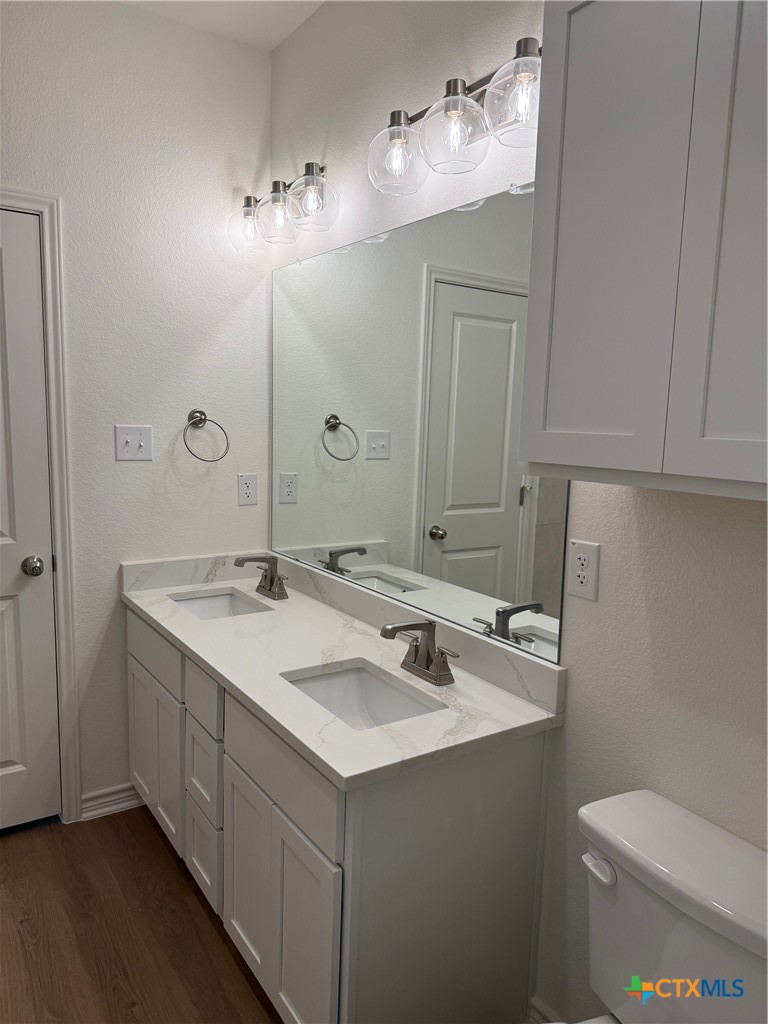 7117 Touchstone Drive Temple, TX 76502 - Photo 10 of 13 a bathroom with a sink and a mirror