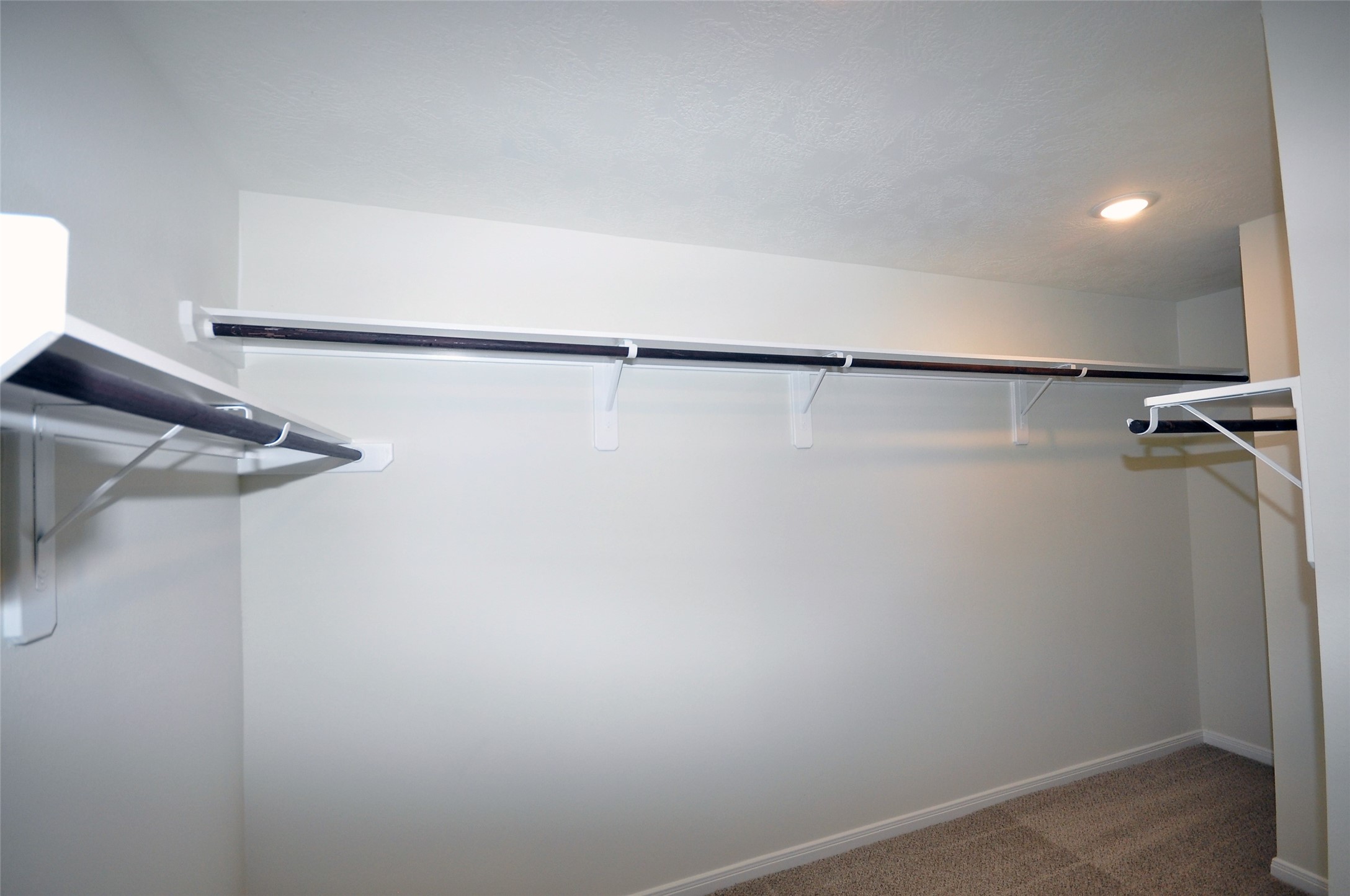 3502 Bahia Road League City, TX 77573 - Photo 17 of 40 a view of a room with racks on the wall