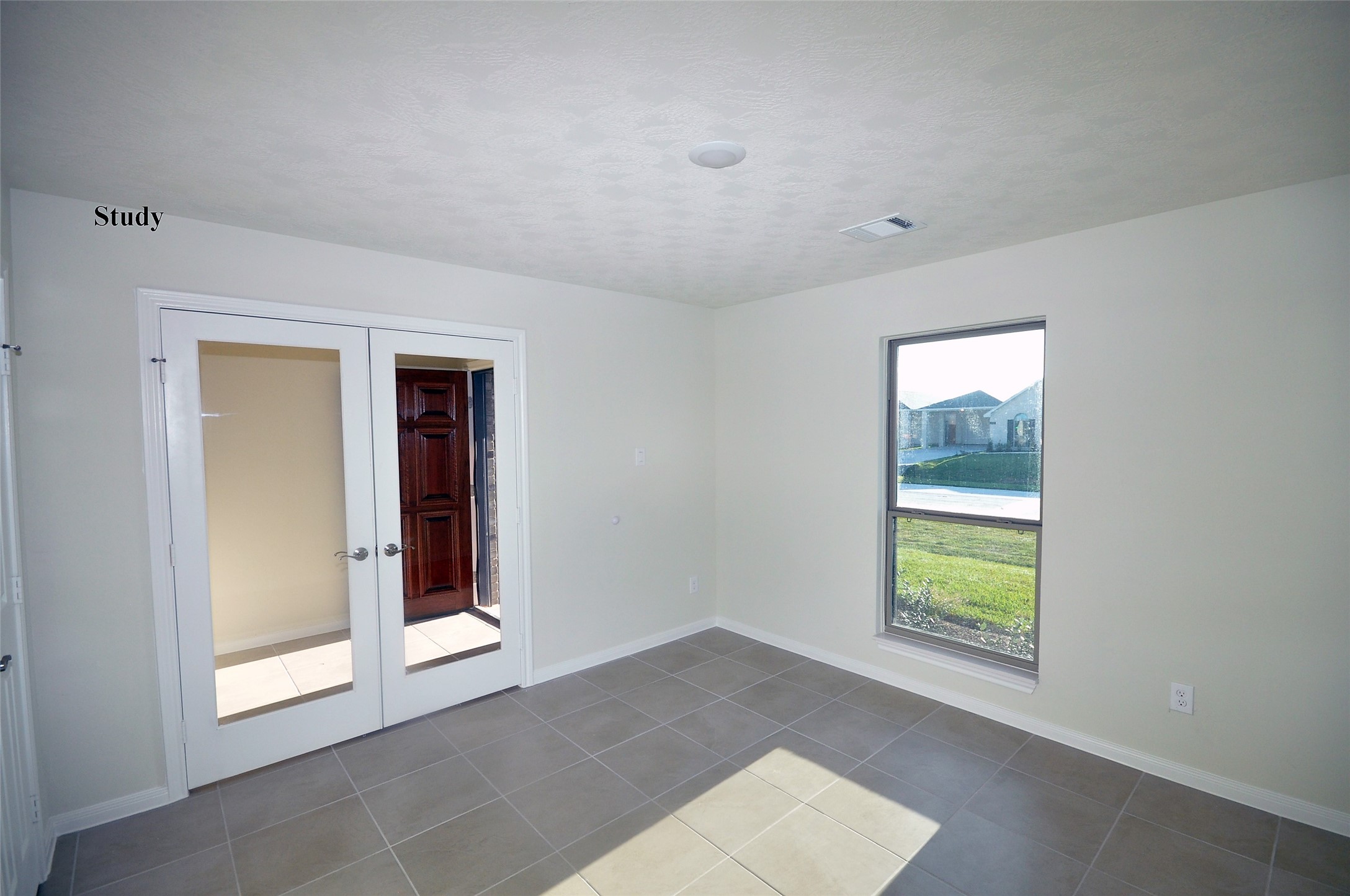 3502 Bahia Road League City, TX 77573 - Photo 18 of 40 a view of an empty room with window and closet area