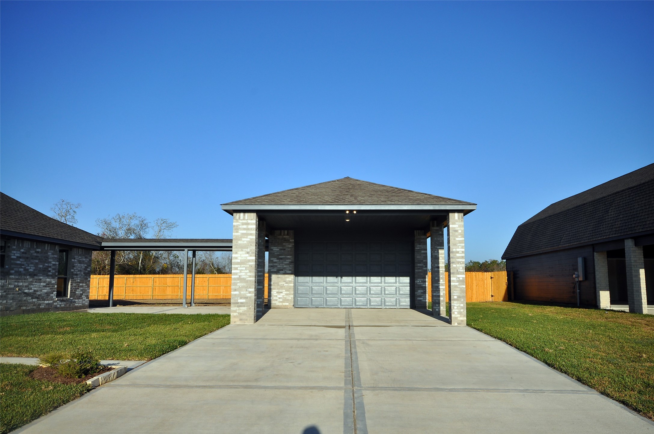 3502 Bahia Road League City, TX 77573 - Photo 28 of 40 a front view of a house with a yard