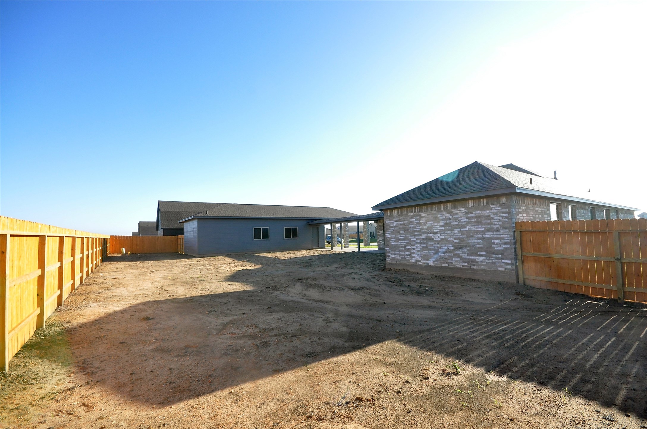 3502 Bahia Road League City, TX 77573 - Photo 36 of 40 a view of a house with wooden fence