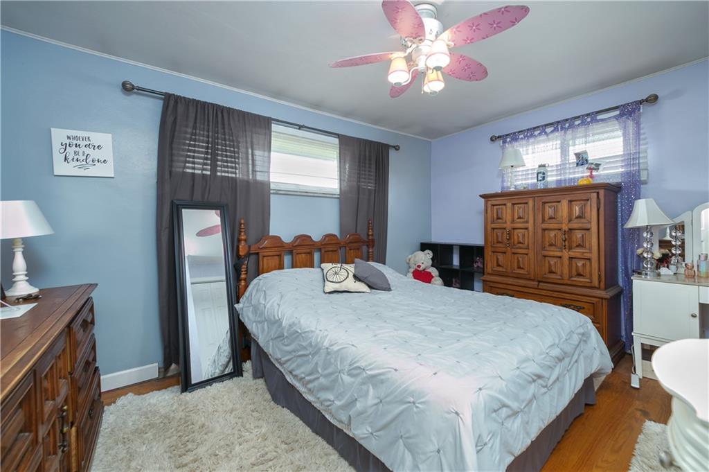 3400 Pittsburgh Road Perryopolis, PA 15473 - Photo 11 of 23 a bedroom with a bed and a dresser