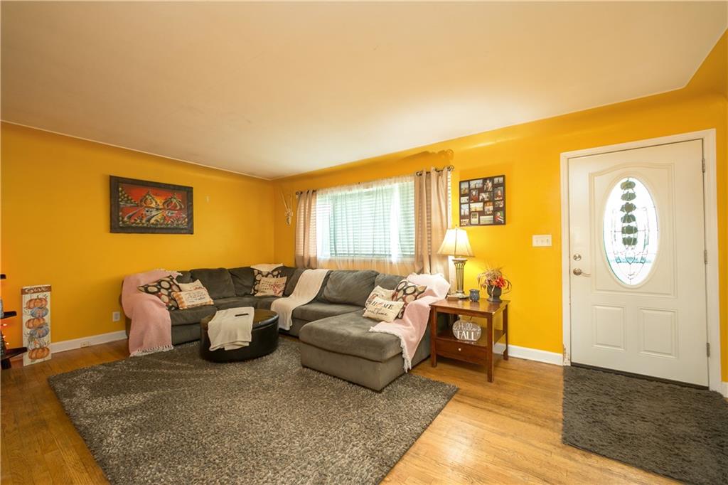 3400 Pittsburgh Road Perryopolis, PA 15473 - Photo 2 of 23 a living room with furniture and wooden floor