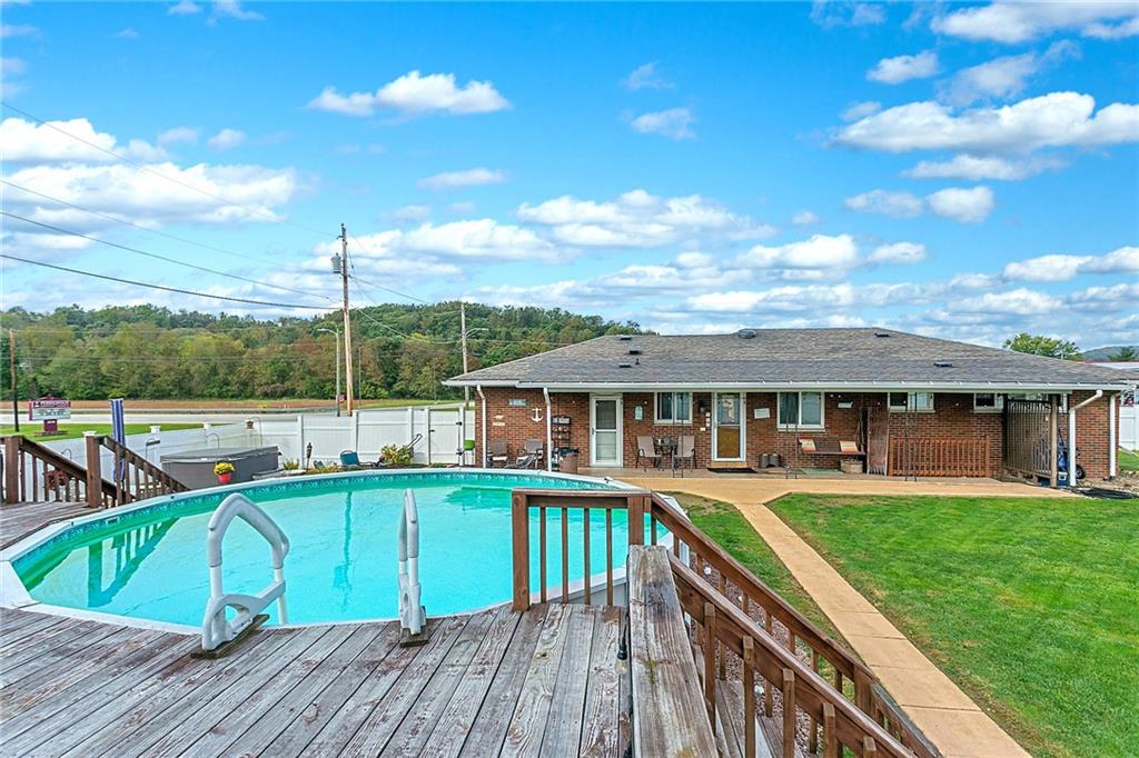 3400 Pittsburgh Road Perryopolis, PA 15473 - Photo 21 of 23 a view of a house with pool and chairs