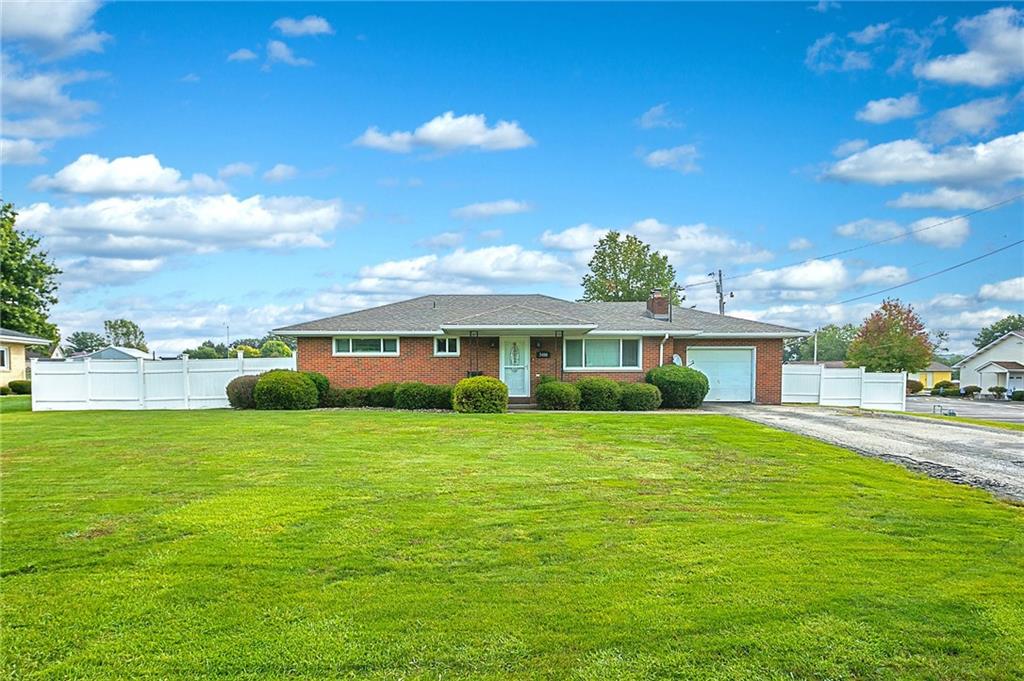 3400 Pittsburgh Road Perryopolis, PA 15473 - Photo 23 of 23 a front view of a house with a garden