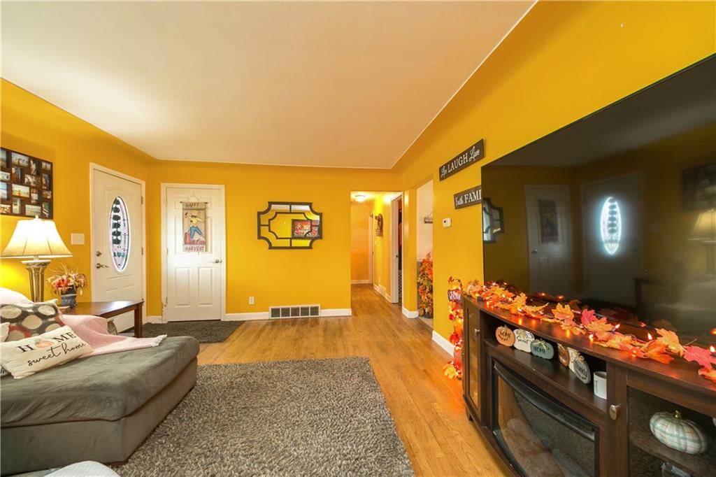3400 Pittsburgh Road Perryopolis, PA 15473 - Photo 3 of 23 a living room with furniture and a flat screen tv