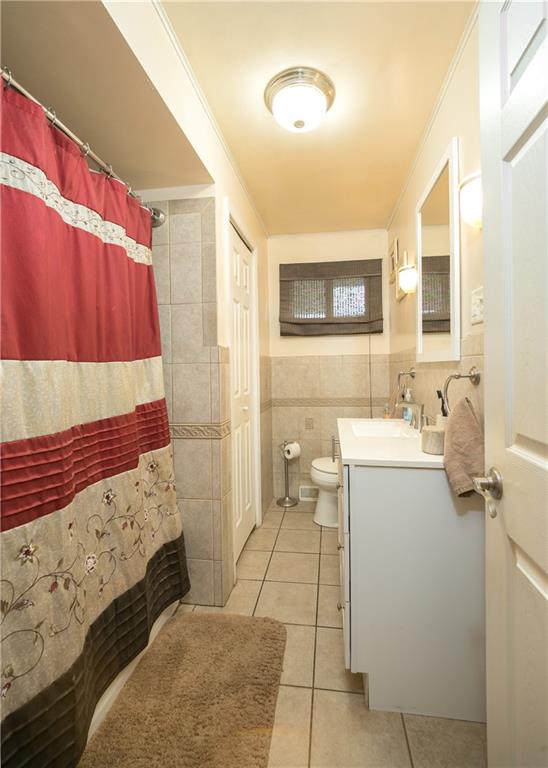 3400 Pittsburgh Road Perryopolis, PA 15473 - Photo 10 of 23 a bathroom with a sink toilet and shower