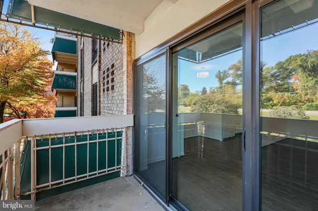 a front view of a house with a glass door