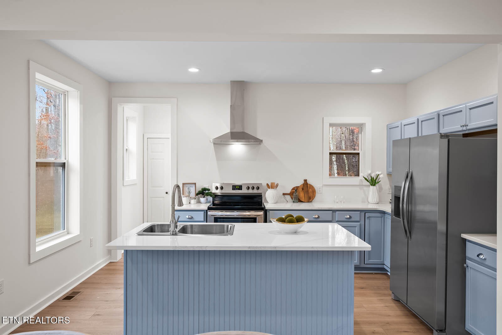 1023 West Laurel Way Monterey, TN 38574 - Photo 13 of 60 a kitchen with stainless steel appliances a sink stove and refrigerator