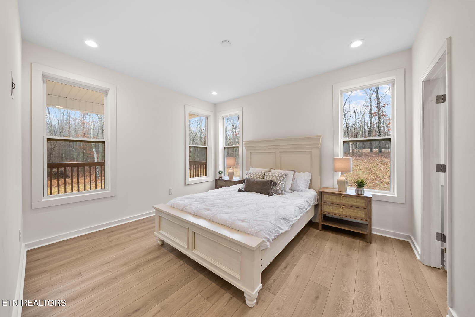 1023 West Laurel Way Monterey, TN 38574 - Photo 17 of 60 a bedroom with a bed and wooden floor