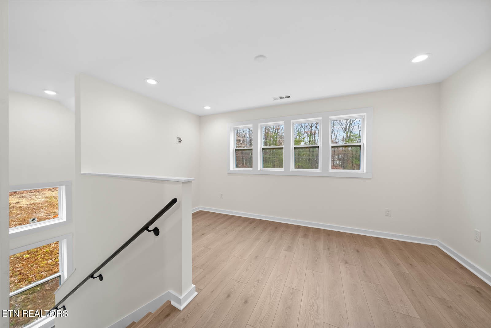 1023 West Laurel Way Monterey, TN 38574 - Photo 28 of 60 a view of empty room with wooden floor and fan