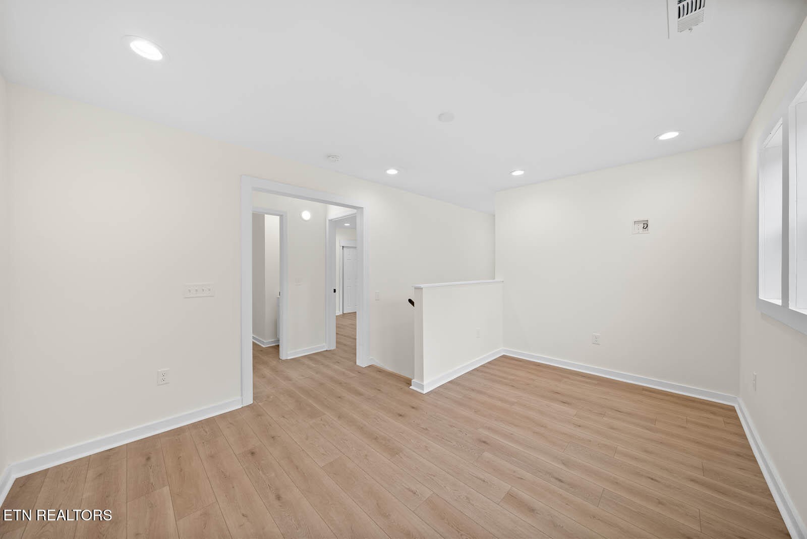 1023 West Laurel Way Monterey, TN 38574 - Photo 30 of 60 wooden floor in an empty room with a window