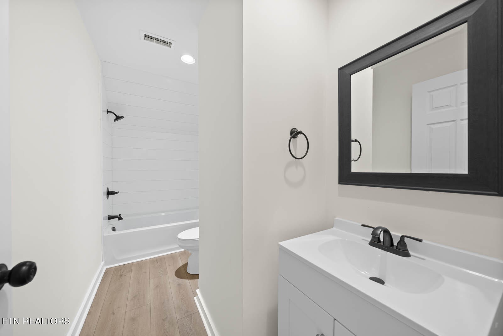 1023 West Laurel Way Monterey, TN 38574 - Photo 34 of 60 a bathroom with a sink and a mirror