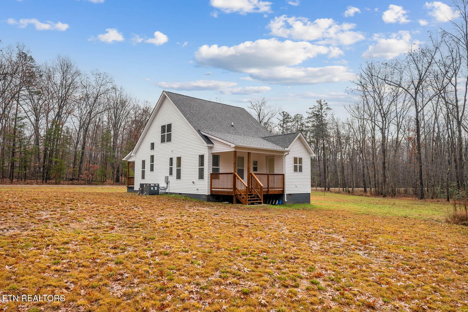 1023 West Laurel Way Monterey, TN 38574 - Photo 49 of 60 a view of a house with a yard and trees