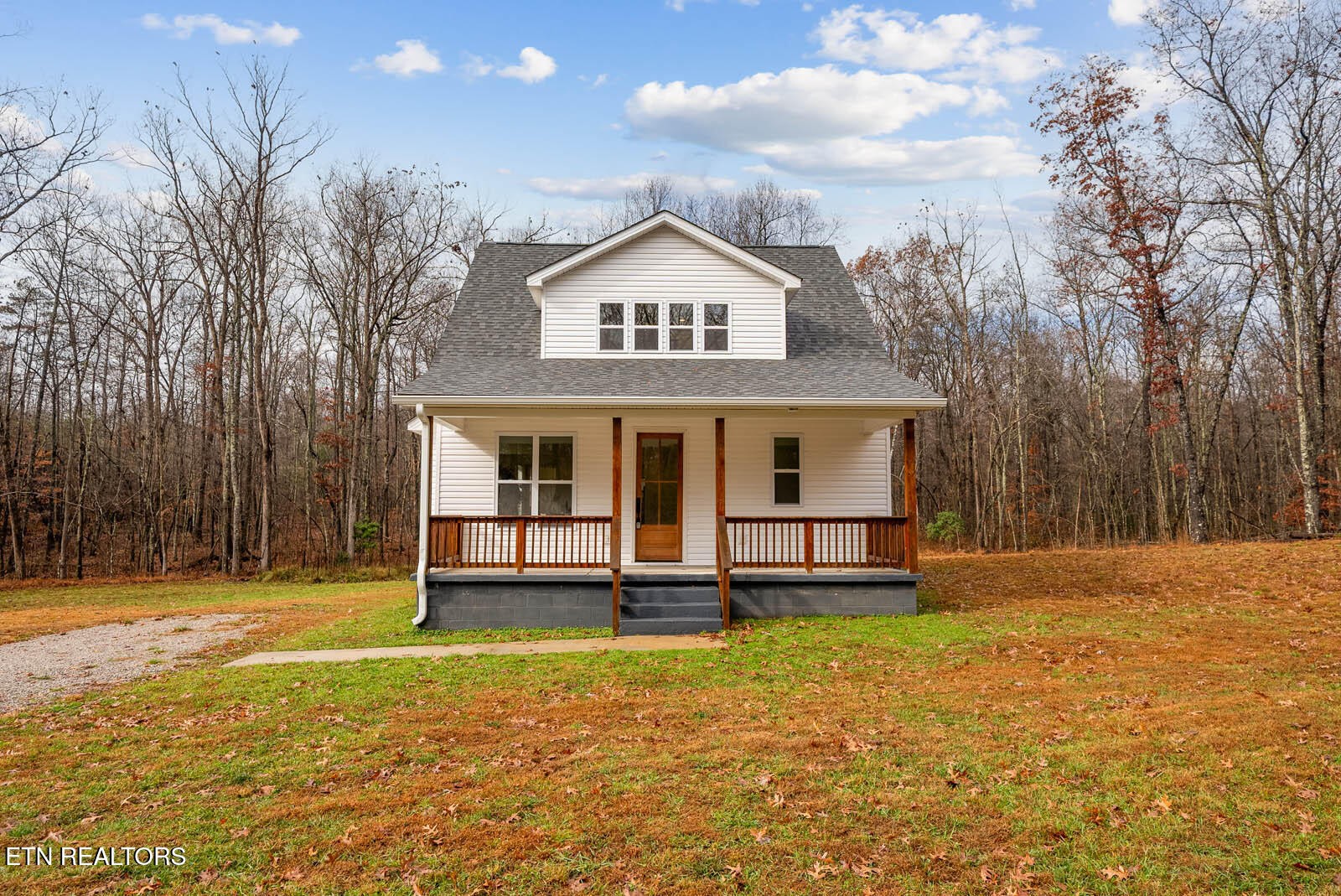 1023 West Laurel Way Monterey, TN 38574 - Photo 50 of 60 a front view of a house with a yard
