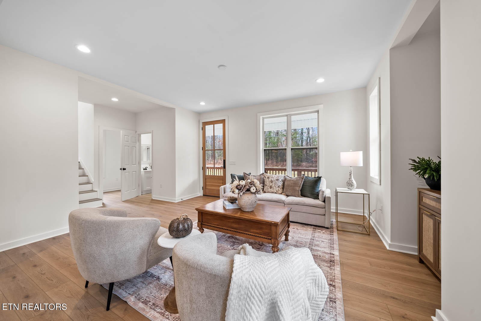 1023 West Laurel Way Monterey, TN 38574 - Photo 7 of 60 a living room with furniture and a large window
